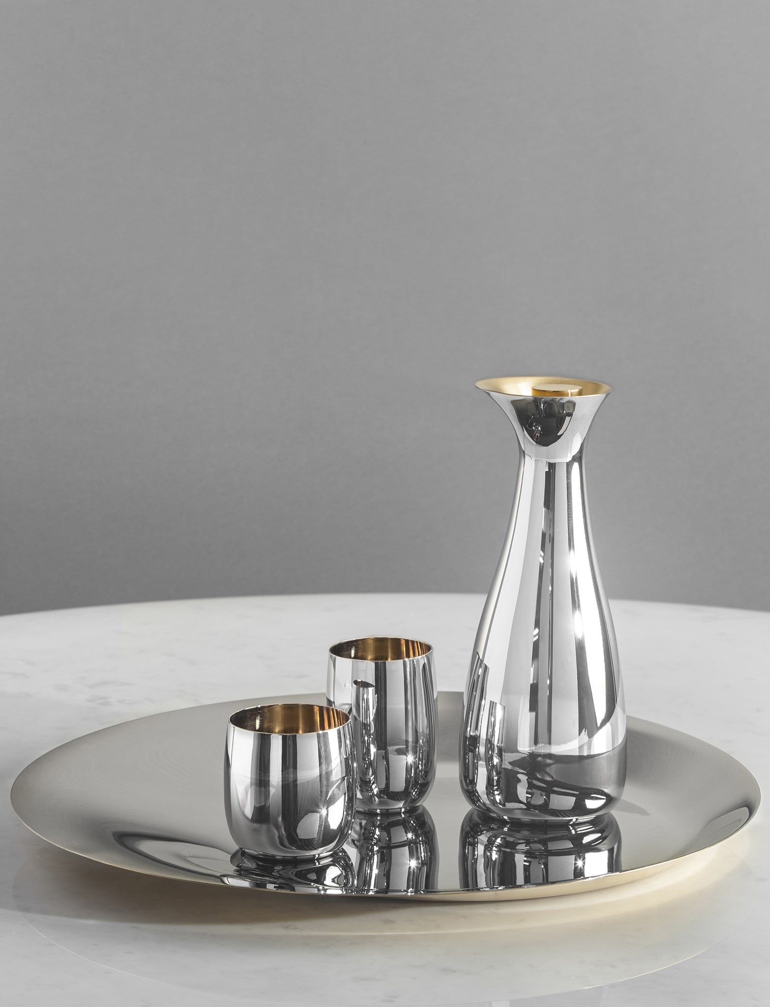 Stelton Norman Foster plat inox 46 cm doré
